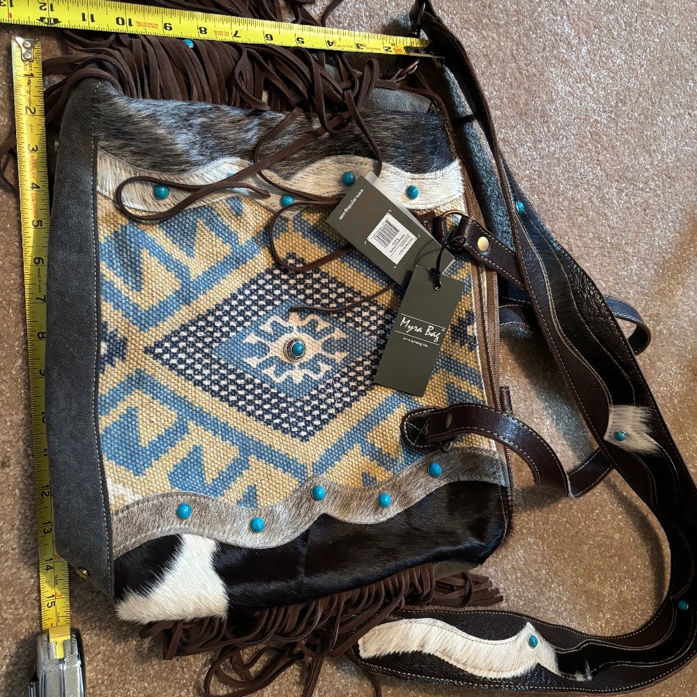 Myra Cow print fringe bag